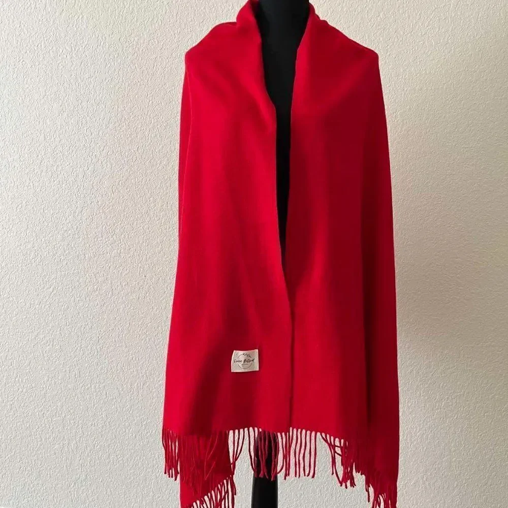 Soft warm scarf is a mixture of acrylic and cashmere condition is new